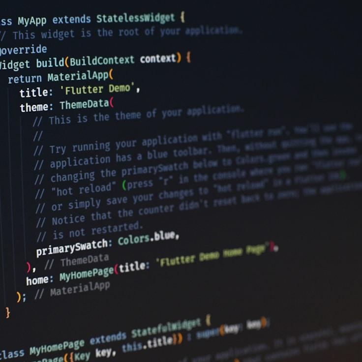 Mobile app project planning workspace with devices and development tools
